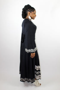 Long Black Wrap Dress with white embroidery detail long sleeves